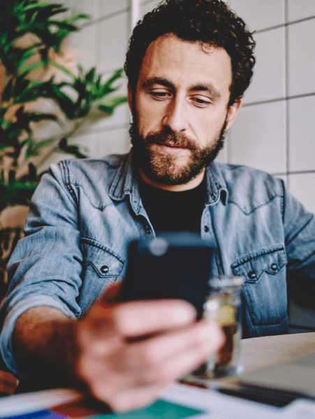 Person using TotalAV&trade; Antivirus